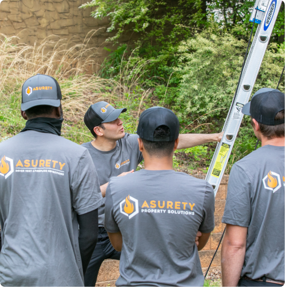 Group of workers around a ladder